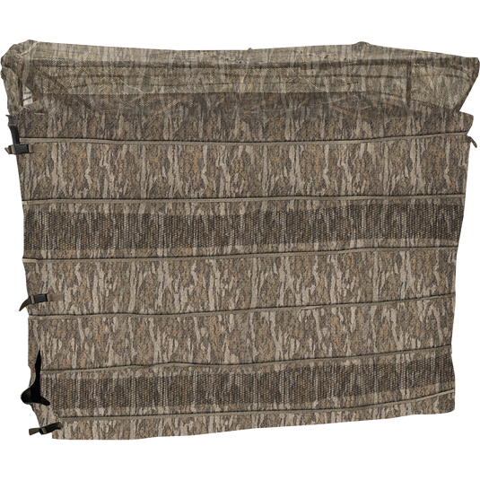 Image alt text: "Ghillie 3-Man Run-N-Gun Blind with No-Shadow Dual Action Top, a compact camo blind with adjustable legs and brush straps for waterfowl hunting."