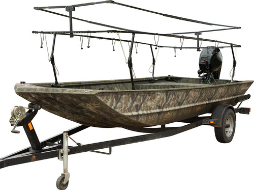 Ghillie Boat Blind with No-Shadow Dual Action Top on a trailer, featuring a boat with a motor and tire.