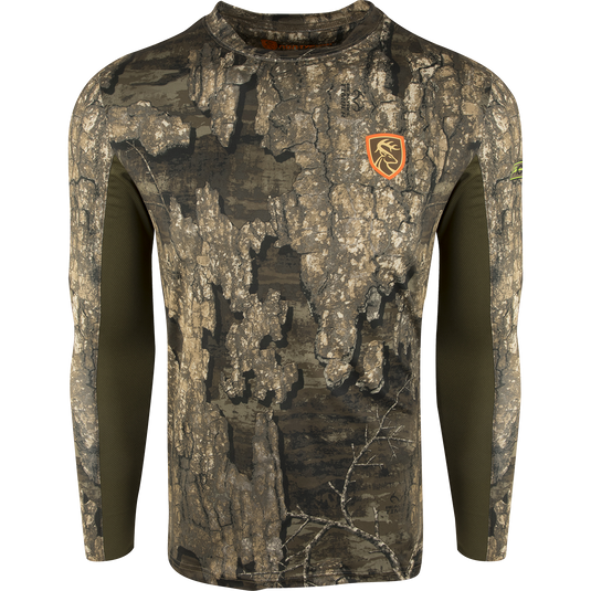 A camouflage long sleeved shirt with Agion Active XL scent control technology, perfect for early season hot weather walks to and from the stand. Moisture-wicking, quick-drying, and fade-resistant.