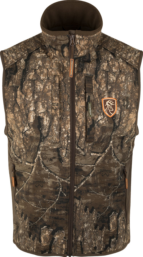 Camo Tech Vest with Agion Active XL: A camo-patterned vest for bow hunters, allowing quiet, precise movement. Windproof lining, multiple pockets, and drawstring waist for all-season versatility and protection.