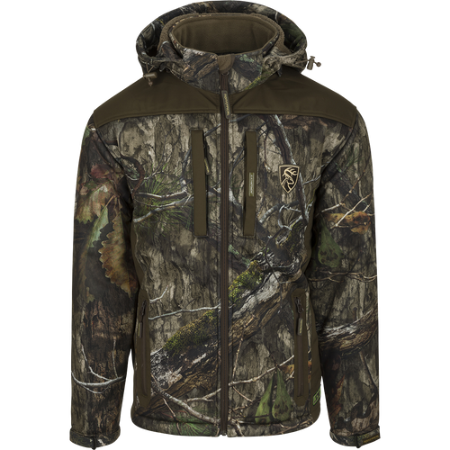 Standstill Windproof Jacket with Agion Active XL™, featuring a camouflage pattern and a logo of a deer. Perfect for late season hunting, this heavy-weight jacket is incredibly soft, quiet, and durable, providing protection against the harsh cold and winds.