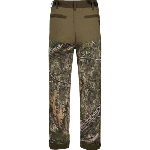 A pair of Standstill Windproof Pants with Agion Active XL®, perfect for late-season hunts. Soft, quiet, and durable, these pants are your best weapon against the cold and winds. Features adjustable waist and cuffs, front slash pockets, cargo pockets, and rear pockets.