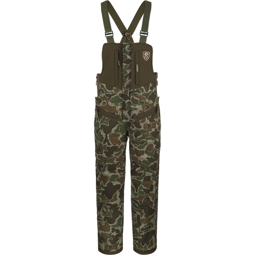 A camouflage bib with straps, perfect for late-season hunting. Made with durable fabric and Agion Active XL® scent control technology.
