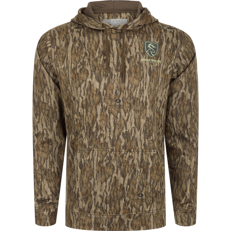 Performance Hoodie: A camouflage hoodie with a logo on it, featuring a double-lined hood for wind protection and extra warmth. Soft, combed fleece interior enhances comfort, heat retention, and moisture management. Kangaroo pouch provides additional warmth. Improved stretch and fit for increased range-of-motion.