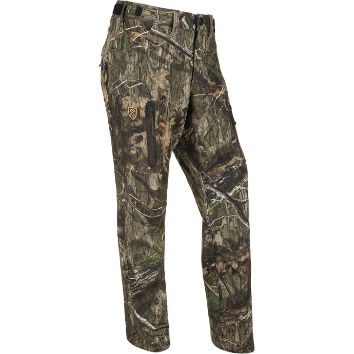 A pair of Pursuit Tech Stretch Pants with Agion Active XL®, featuring camouflage pattern, zippered pockets, and 4-way stretch for comfort during hunting.