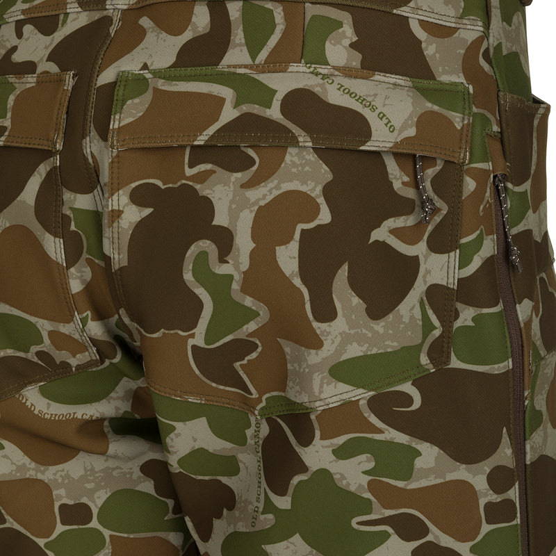 A close-up of the Pursuit Tech Stretch Pant with Agion Active XL® in camouflage pattern, featuring zippered pockets and vents. Lightweight and durable, perfect for early-mid season big game hunting.