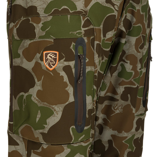 A camouflage pants with logo, zippered pockets, and hip vents. Durable and comfortable for cool to cold days afield. Lightweight Early-Mid Season big game pant. Pursuit Tech Stretch Pant with Agion Active XL.
