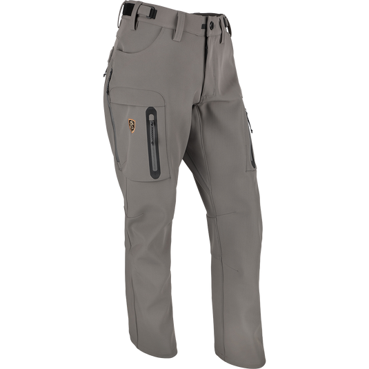 A pair of Pursuit Tech Stretch Pants with Agion Active XL® for cool to cold days afield. Durable and comfortable, these 100% polyester bonded fleece pants have 4-way stretch for ease of use during the hunt. Features zippered pockets on legs and rear, and side zippered hip vents. Lightweight Early-Mid Season big game pant.