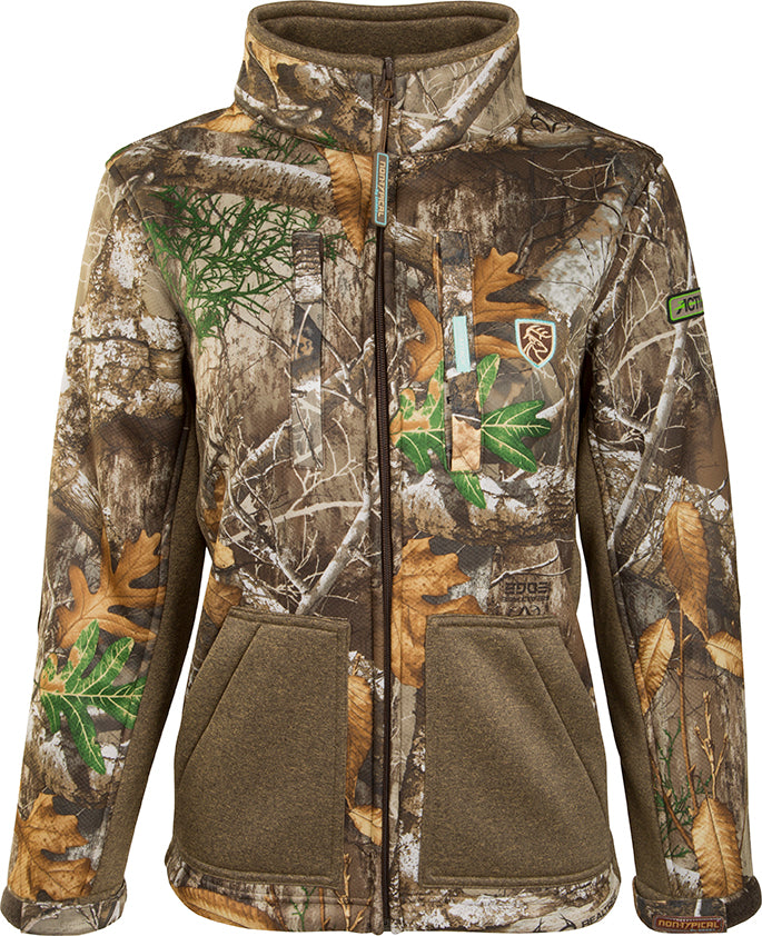A women's Silencer Jacket with Agion Active XL, featuring a camouflage pattern and sherpa fleece lining for warmth and breathability. Equipped with vertical chest pockets.
