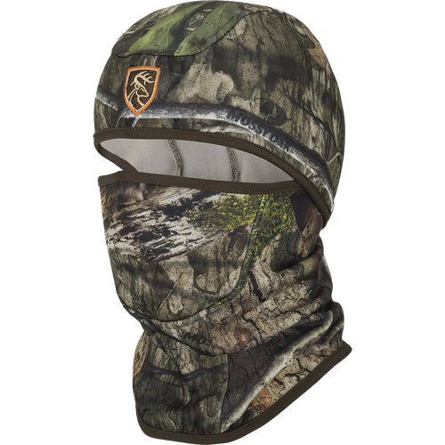 A camouflage mask with a logo, perfect for concealment and comfort in the field. Balaclava with Agion Active XL.