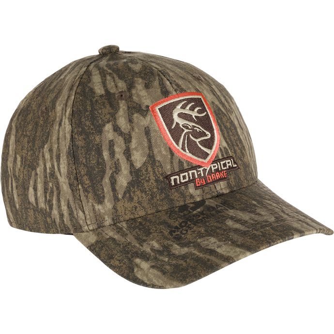 Non-Typical Logo Camo Cap made of 100% cotton twill fabric. Features six-panel construction, mid-profile fit, and hook & loop closure.