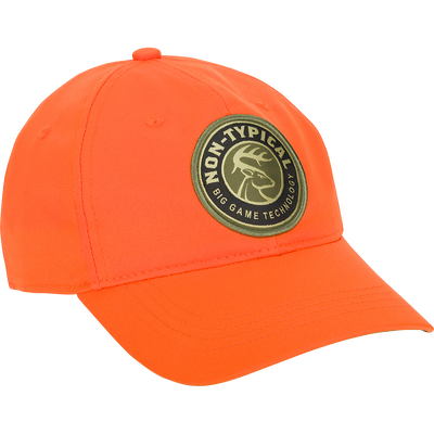 A close-up of the Big Game Technology Patch Camo Twill Cap, a lightweight cotton/polyester cap with camo concealment under the bill. Six-panel construction with adjustable snap closure.