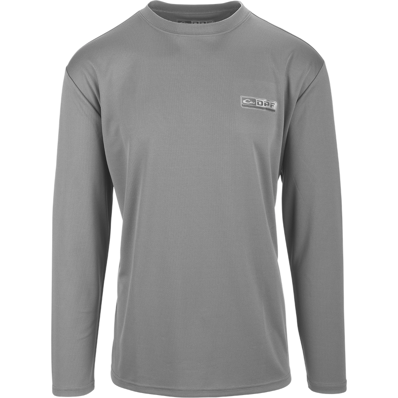 A versatile Performance Mesh Crew with built-in stretch, UPF 50 sun protection, and moisture-wicking fabric. Features thumbholes for added sleeve protection and a square hem. Perfect for outdoor enthusiasts.