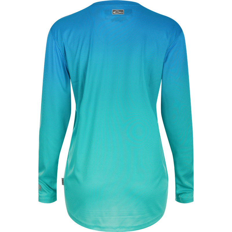 A lightweight, high-performance crew shirt for women with a unique Ombre Dot pattern and built-in cooling technology. Perfect for outdoor activities.