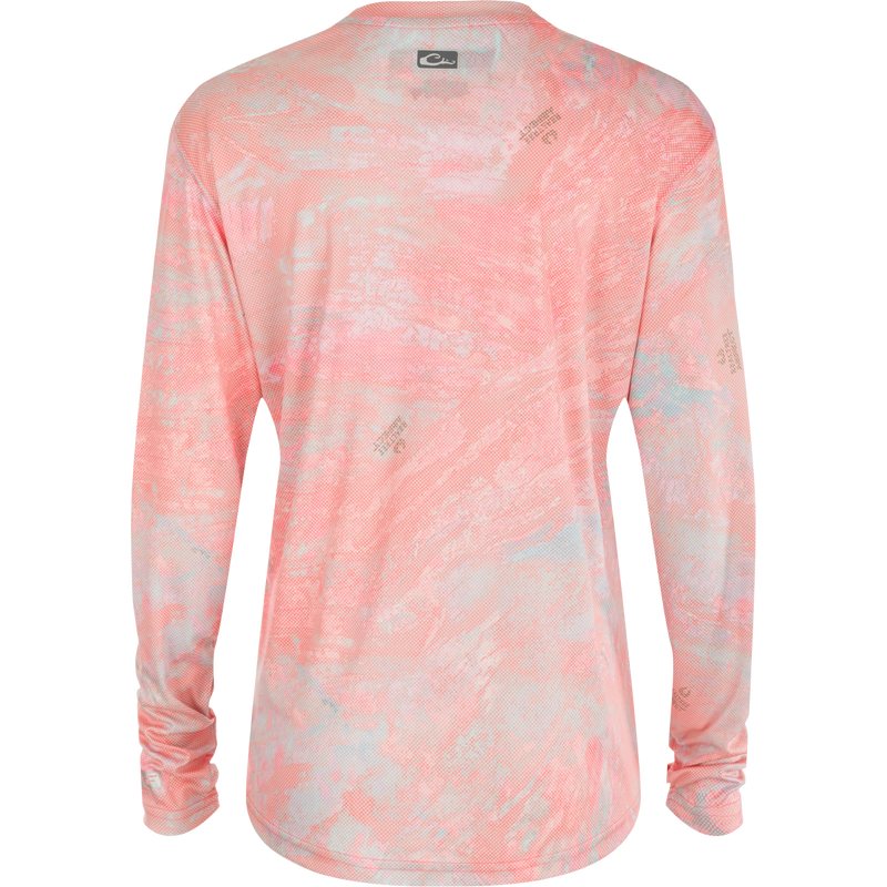 Women's Performance Crew Realtree Aspect Dot: A lightweight, long-sleeved shirt with built-in cooling, UPF 50 sun protection, moisture-wicking, and quick-drying features. Perfect for outdoor activities like fishing or beach outings.