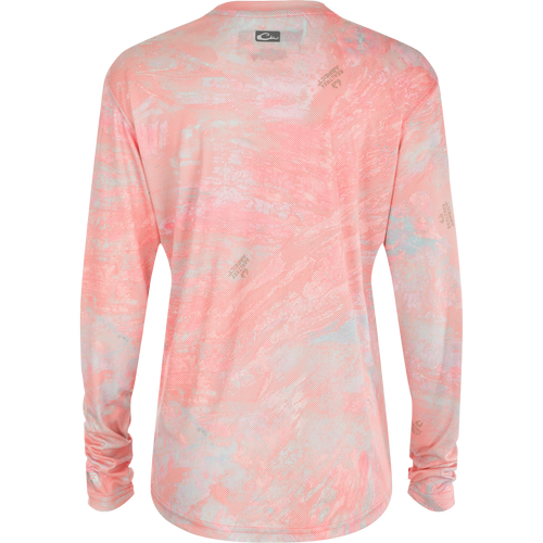 Women's Performance Crew Realtree Aspect Dot: A lightweight, long-sleeved shirt with built-in cooling, UPF 50 sun protection, moisture-wicking, and quick-drying features. Perfect for outdoor activities like fishing or beach outings.