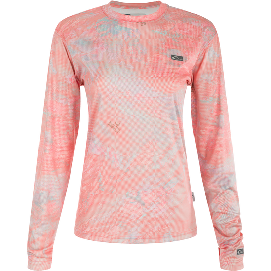 Women's Performance Crew Realtree Aspect Dot: A lightweight, long-sleeved shirt with built-in cooling, UPF 50 sun protection, moisture-wicking, and quick-drying features. The shirt showcases the exclusive Realtree Aspect Fish Camo pattern with a digitally printed Micro Dot for a dynamic look. Perfect for water activities, beach outings, or any performance needs.