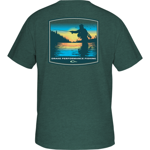 Casting Dawn T-Shirt: Back of a t-shirt featuring a man fishing in scenic waters. Drake Performance Fishing logo on front. Lightweight and comfortable.