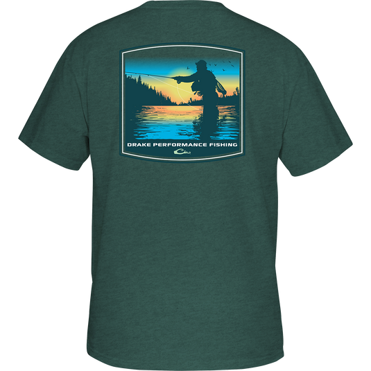 Casting Dawn T-Shirt: Back of a t-shirt featuring a man fishing in scenic waters. Drake Performance Fishing logo on front. Lightweight and comfortable.