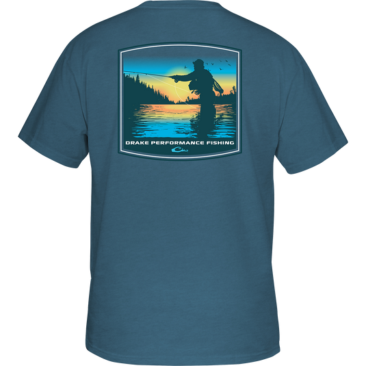 Casting Dawn T-Shirt: Back of a blue shirt with a man fishing in the water, featuring a scenic fishing graphic and the DPF Flag logo on the front. Lightweight and comfortable, made with a cotton/polyester blend.