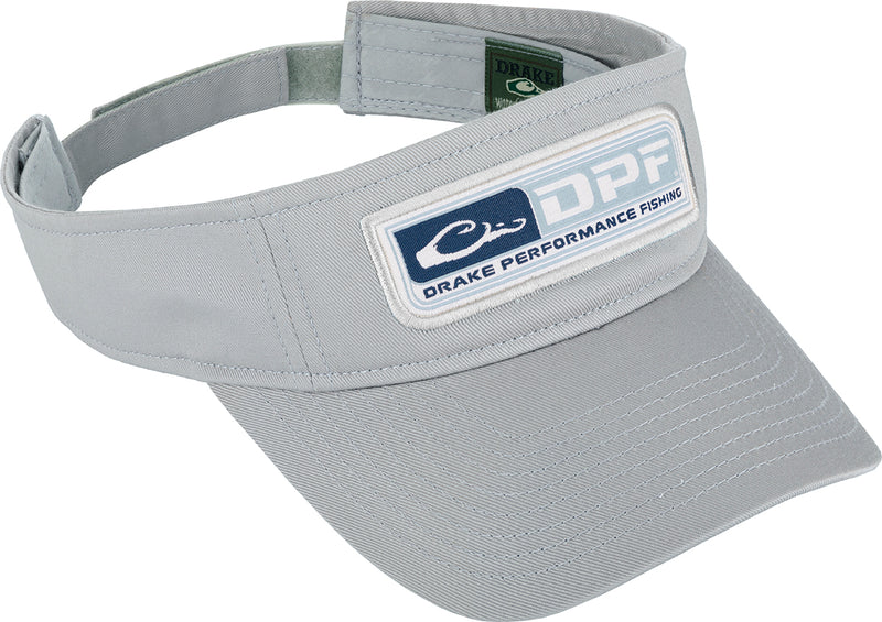 A low-profile visor with the Drake Fishing logo on the front. Perfect for maximum comfort on the water. Features a pre-curved bill and hook & loop closure. 100% cotton twill material. One size fits most.