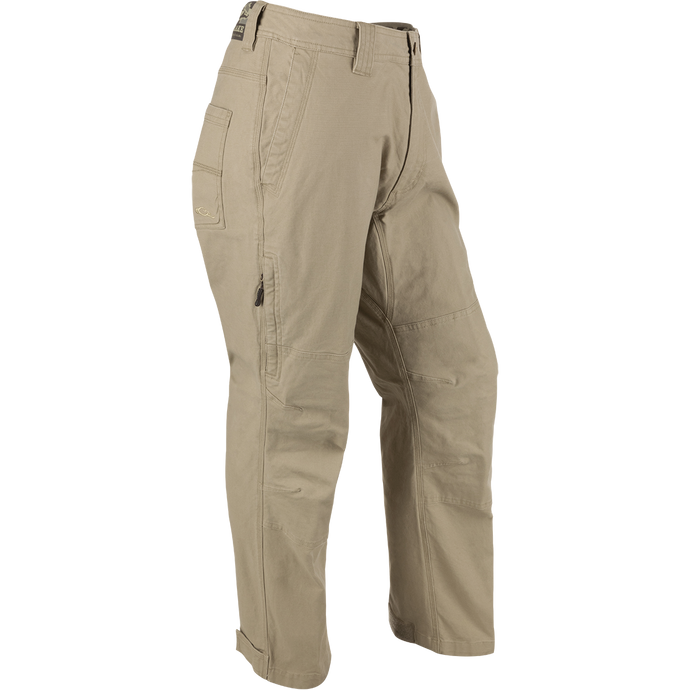 Khaki Canvas Waterfowler's Pant: Lightweight cotton canvas pant for under-wader or casual wear. Garment-washed for softness. Features include ankle cuffs, rear pockets, side storage pocket, and zippered fly.