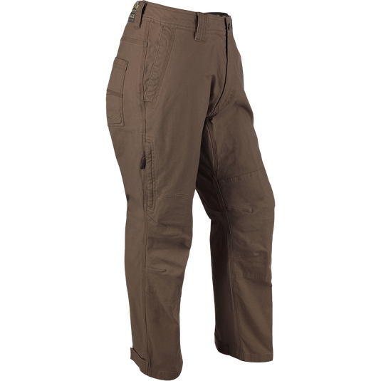 Olive Canvas Waterfowler's Pant: Lightweight cotton canvas pant for under-wader or casual wear. Garment-washed for softness. Features include  ankle cuffs, rear pockets, side storage pocket, and zippered fly.