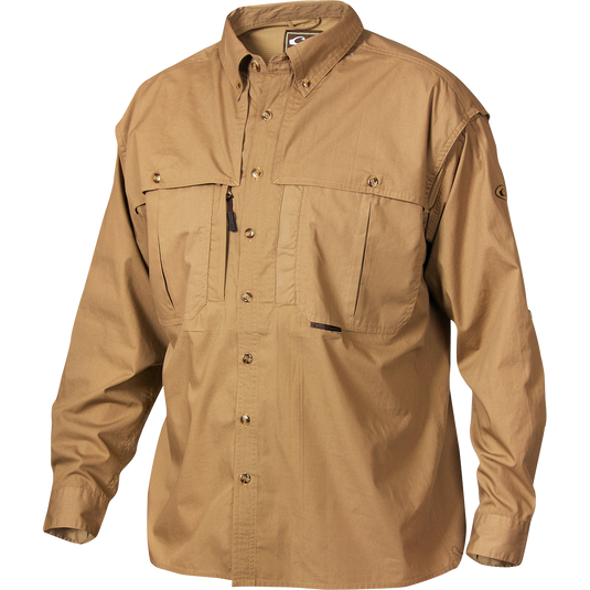 A long-sleeved tan cotton blend shirt with front and back ventilation, oversized chest pockets, and a vertical zippered pocket on the right chest. Stay cool and comfortable in warm weather with the StayCool™ fabric. Perfect for outdoor activities or a casual day at the office.