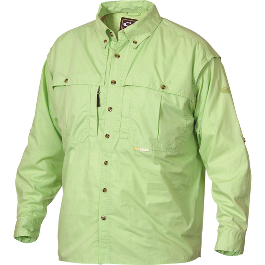 Cotton Wingshooter's Shirt with StayCool™ Fabric L/S: A functional green shirt with buttons, designed with oversized chest pockets and a vertical zippered pocket. Stay cool and manage moisture with front and back ventilation. Perfect for outdoor activities or a casual day in the office.