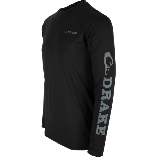 Performance Long Sleeve Crew Solid: A lightweight, moisture-wicking shirt with UPF 50 sun protection and built-in stretch for all-day comfort. Ideal for outdoor activities like hunting and fishing.