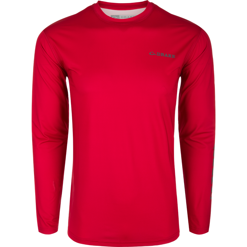 Performance Long Sleeve Crew Solid, a functional shirt with cooling, UPF 50, moisture-wicking, and quick-drying features. Lightweight and versatile for any weather conditions. Ideal for water, field, or active wear.