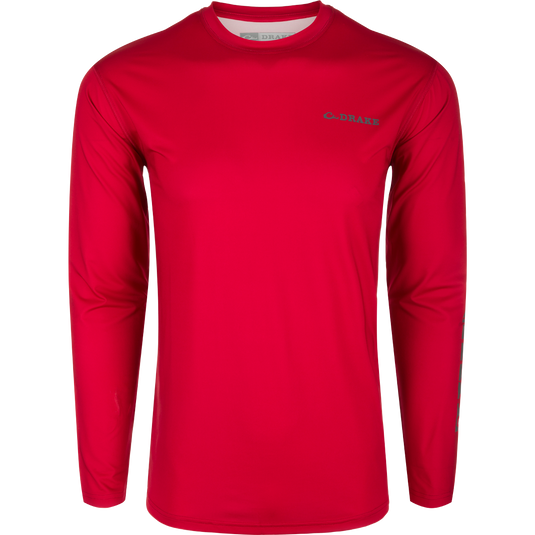 Performance Long Sleeve Crew Solid, a functional shirt with cooling, UPF 50, moisture-wicking, and quick-drying features. Lightweight and versatile for any weather conditions. Ideal for water, field, or active wear.