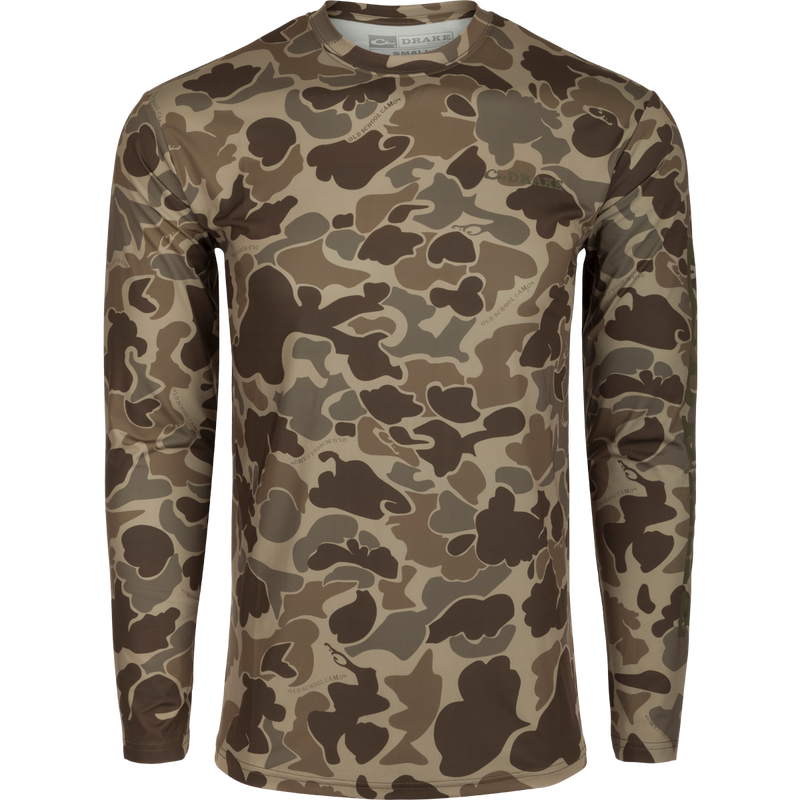 Performance Crew: A camouflage shirt with a logo, made of lightweight, moisture-wicking fabric. UPF 50 sun protection and quick-drying for all-weather wear. Ideal for hunting, fishing, and outdoor activities.