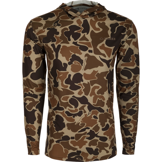 Performance Hoodie with camouflage pattern, long sleeves, and logo detail. Lightweight, moisture-wicking fabric with UPF 50 sun protection. Ideal for all weather conditions. From Drake Waterfowl, high-quality hunting gear and clothing for outdoor enthusiasts.