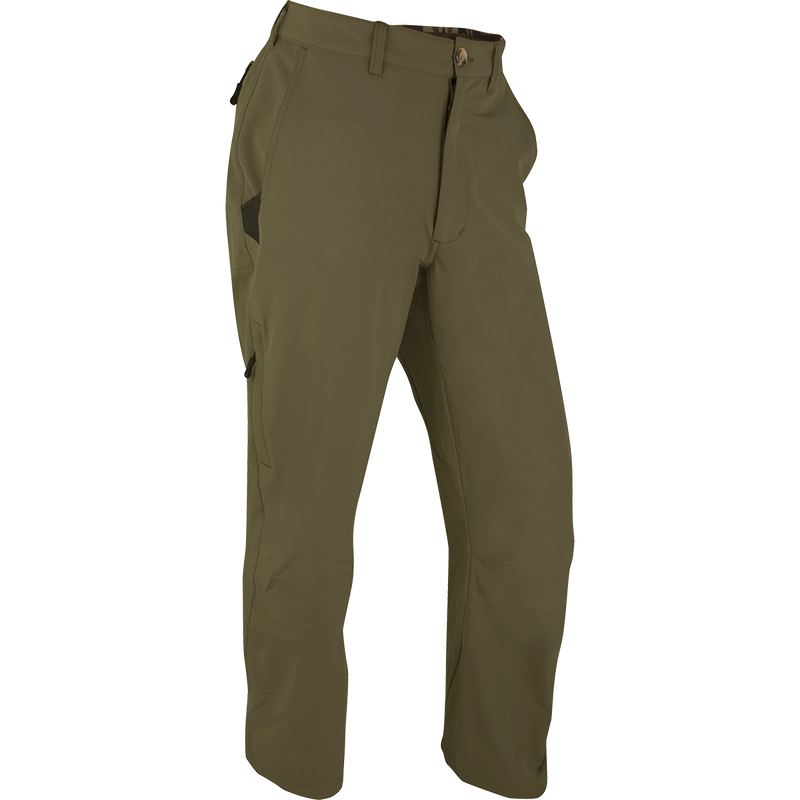 A pair of lightweight and durable Stretch Tech Pants with 4-way stretch, moisture-wicking, and quick-drying features. Gusseted crotch and articulated knee for ease of movement. YKK zippers, side stash pockets, and cargo pockets for trustworthy storage. Perfect for hunting, fishing, and outdoor activities.