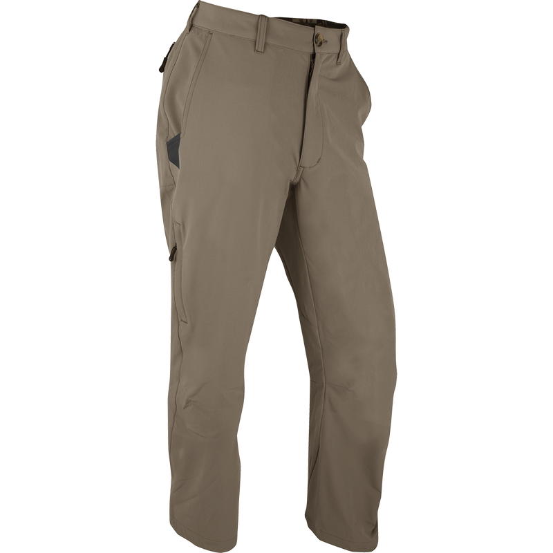 A pair of Stretch Tech Pants with 4-way stretch, moisture-wicking, and gusseted crotch for ease of movement. Features YKK zippers, side stash pockets, and cargo pockets.