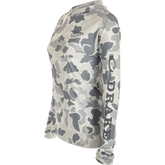 Women's Performance Hoodie Print - a lightweight camouflage shirt with exceptional performance features, including Built-In Cooling, UPF 50, Moisture Wicking, Breathable Stretch, and Quick Drying. Perfect for outdoor activities or as a fashion statement.