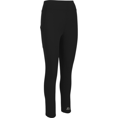 Women's Commando Solid Legging, a high-performance 4-way stretch legging with a 4-inch waistband and side stash pockets. Quick-drying and moisture-wicking for your next adventure.