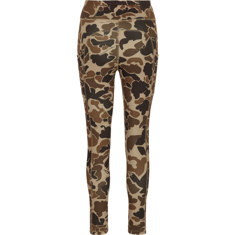 A versatile high-performance legging with a 4-way stretch fabric, angled side seam pockets, and a back zippered waist pocket. Women's Commando Printed Legging in Old School Camo.