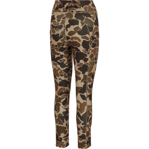 A versatile Women's Commando Printed Legging with Old School Camo pattern. High-performance 4-way stretch fabric, quick drying, moisture-wicking. Features a 4-inch waistband, back zippered pocket, and side stash pockets. Perfect for your next adventure.