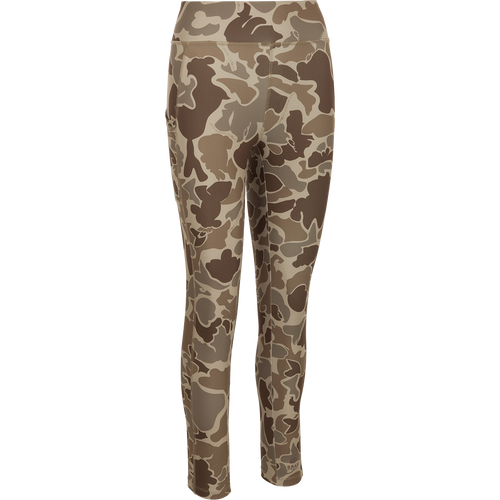 A versatile high-performance legging with a camouflage pattern. 4-way stretch fabric, moisture-wicking, and quick-drying. Features a 4-inch waistband, back zippered pocket, and side stash pockets. Perfect for your next adventure. From Drake Waterfowl.