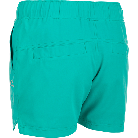 Women's Commando Lined Short 7": A close-up of versatile shorts with a built-in liner. Features scalloped hem, back and front pockets, and elastic waistband with drawstring.