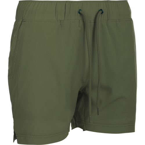 A versatile pair of green shorts with a built-in liner. Made with 88% polyester and 12% spandex for 4-way stretch. Features include front slash pockets, back pockets with closures, and a 4.5