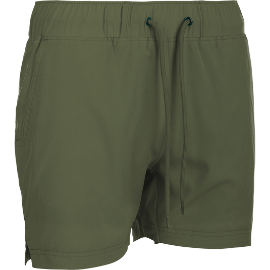 A versatile pair of green shorts with a built-in liner. Made with 88% polyester and 12% spandex for 4-way stretch. Features include front slash pockets, back pockets with closures, and a 4.5