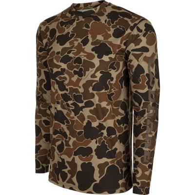 Youth Performance Crew L/S: A lightweight camouflage shirt with built-in cooling, moisture-wicking, and quick-drying features. Provides UPF 50 sun protection.