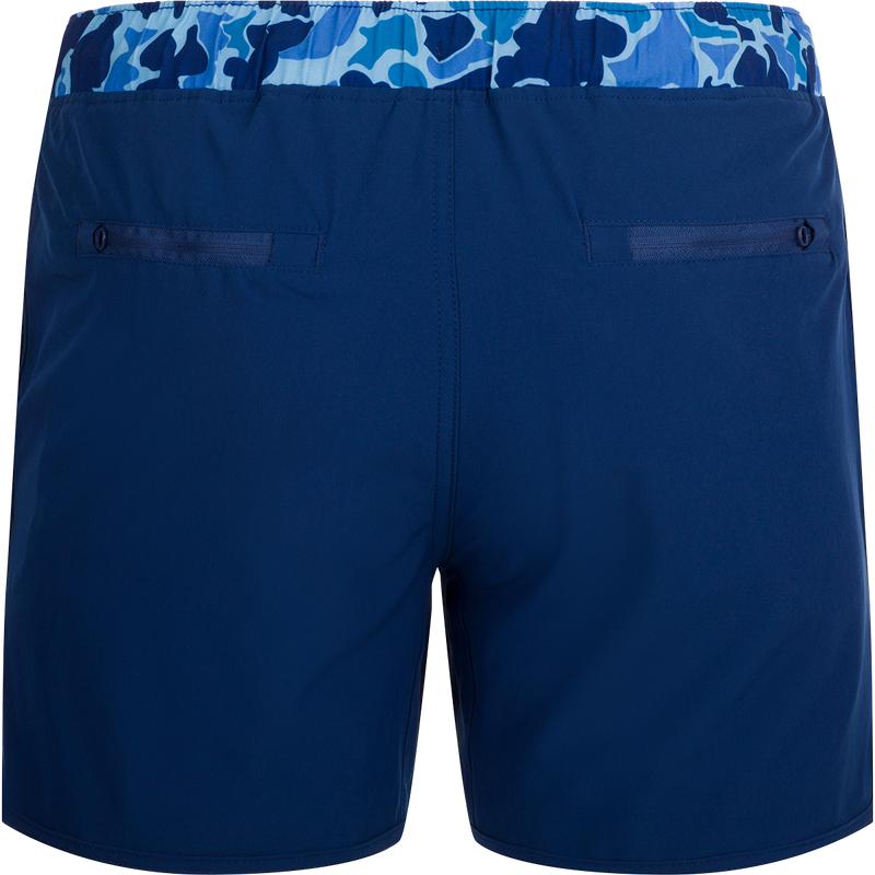 A versatile blue and white camo print shorts with a 5 inseam, built-in liner, and quick-drying fabric. Perfect for the playground or beach.