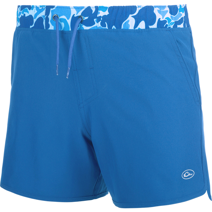 Youth Commando Lined Volley Short 5 - versatile blue shorts with camo print. Quick-drying, moisture-wicking, and water-resistant. Features elastic waistband and adjustable drawstring. Includes front and back pockets with hidden zippers. Scalloped hem and built-in liner.