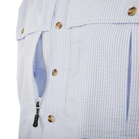 Seersucker Wingshooter's Shirt - A close-up of a blue and white fabric shirt with button-down collar, front and back heat vents, and multiple pockets.