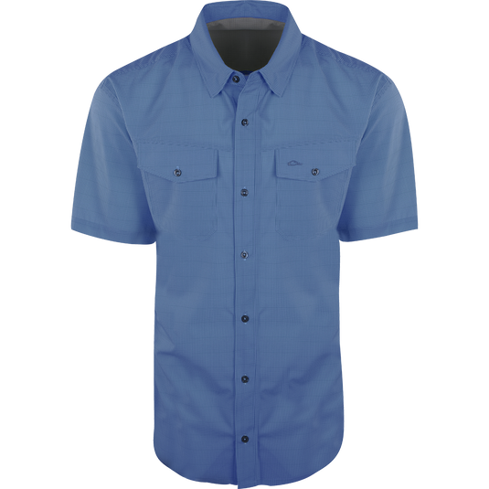 A lightweight, wrinkle-resistant Traveler's Check Shirt S/S with four-way stretch for freedom of movement and ultimate comfort. Moisture-wicking, with 2 chest pockets featuring button flaps. Ideal for the man on the go.