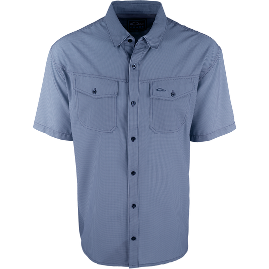 A lightweight, wrinkle-resistant Traveler's Check Shirt S/S with four-way stretch for freedom of movement and ultimate comfort. Ideal for the man on the go, whether on vacation or running around town. Features moisture-wicking fabric and 2 chest pockets with button flaps.